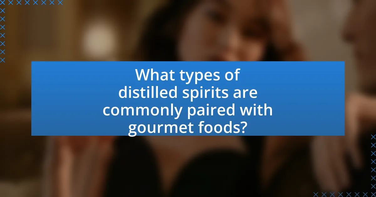 What types of distilled spirits are commonly paired with gourmet foods?